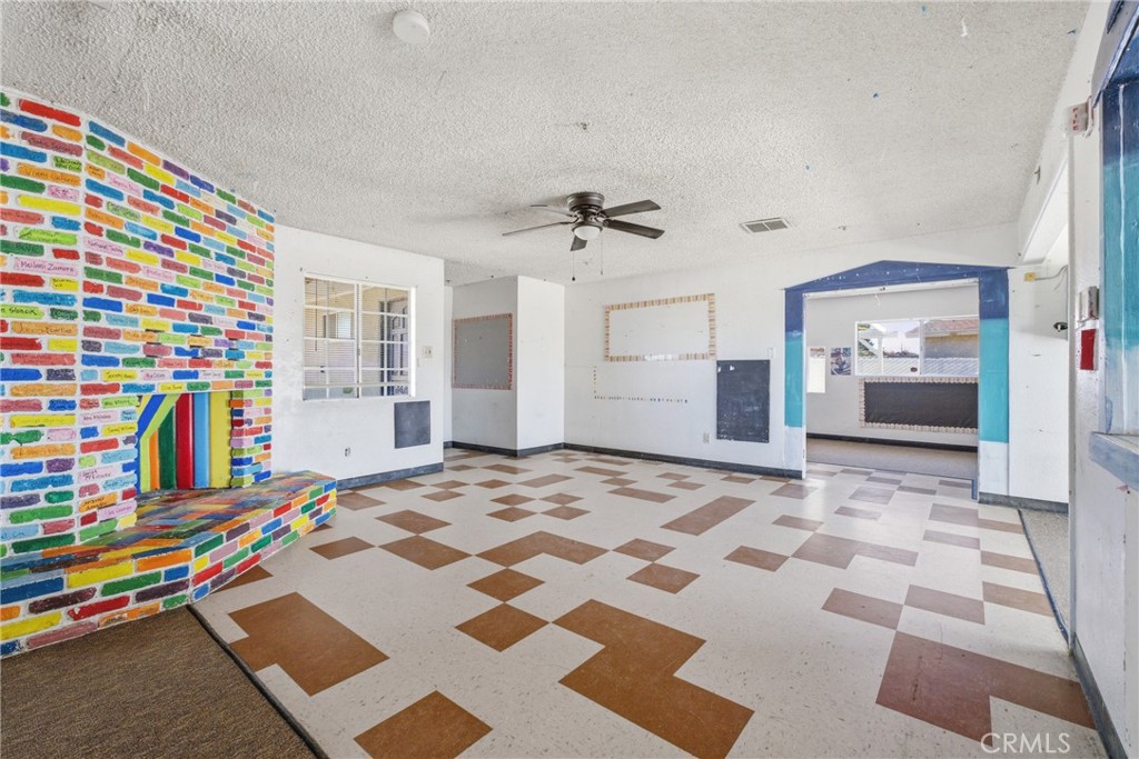 15637 Tuscola Road Apple Valley, CA 92307 - Photo 16 of 57 a very nice looking bedroom with a bed