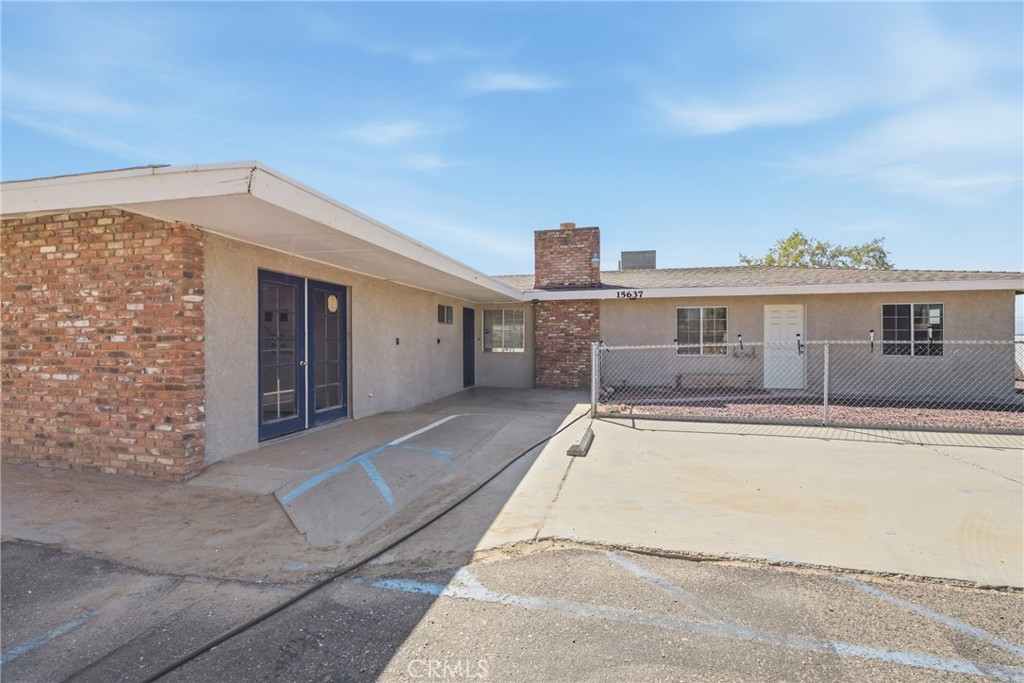 15637 Tuscola Road Apple Valley, CA 92307 - Photo 3 of 57 a view of a house with pool