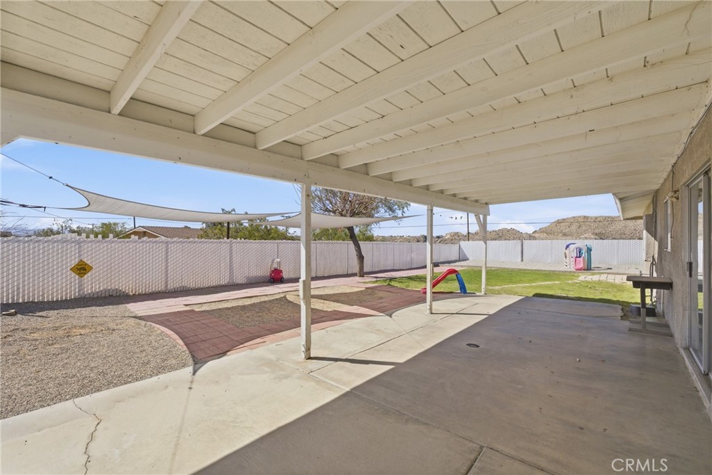 15637 Tuscola Road Apple Valley, CA 92307 - Photo 35 of 57 a view of a backyard