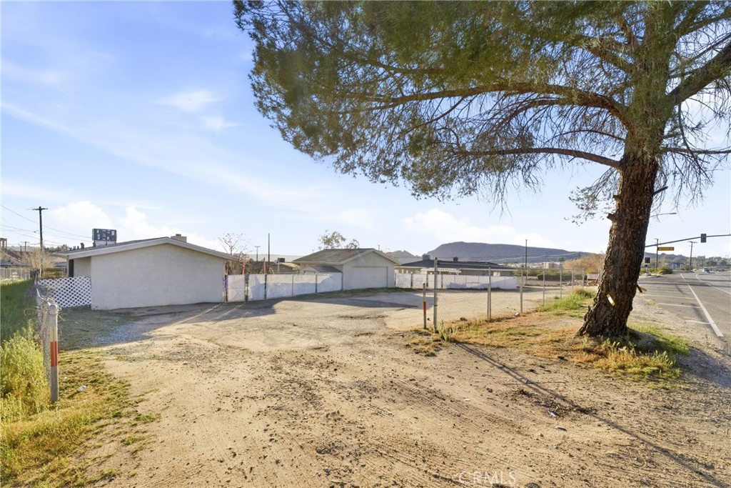 15637 Tuscola Road Apple Valley, CA 92307 - Photo 44 of 57 a view of a lake with a mountain in the background
