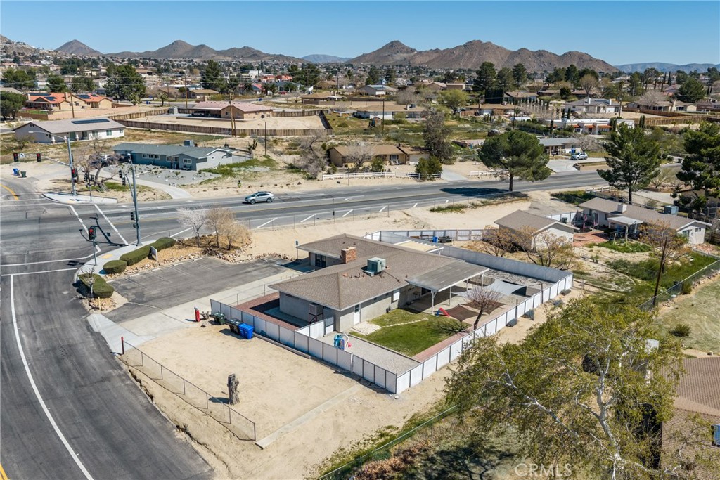15637 Tuscola Road Apple Valley, CA 92307 - Photo 46 of 57 an aerial view of residential houses with outdoor space