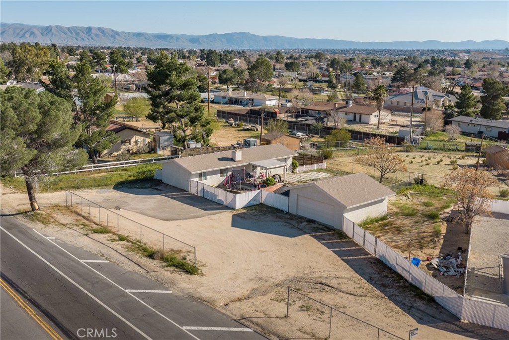 15637 Tuscola Road Apple Valley, CA 92307 - Photo 54 of 57 an aerial view of a house with a ocean view