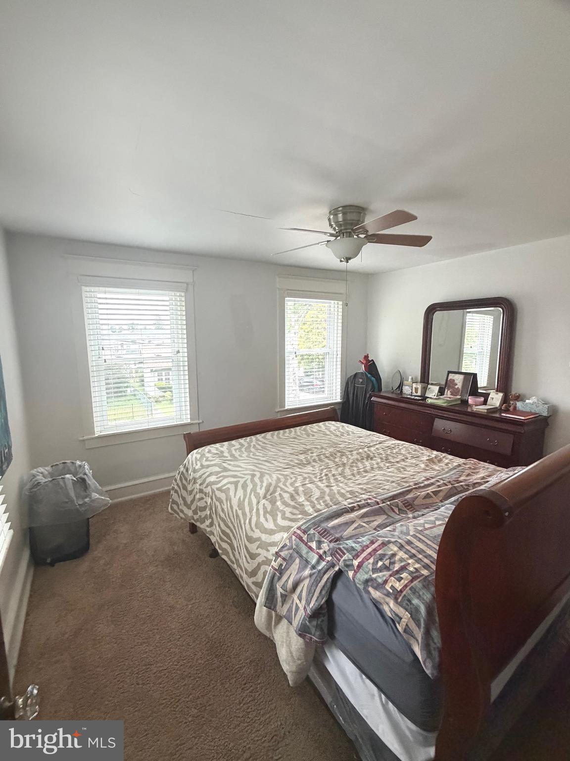 463 Burmont Road Drexel Hill, PA 19026 - Photo 19 of 39 a bed sitting in a bedroom next to a window