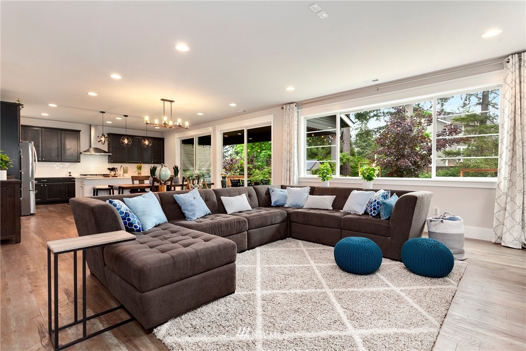 253 Field Place Southeast Renton, WA 98059 - Photo 11 of 40 a living room with furniture and a large window