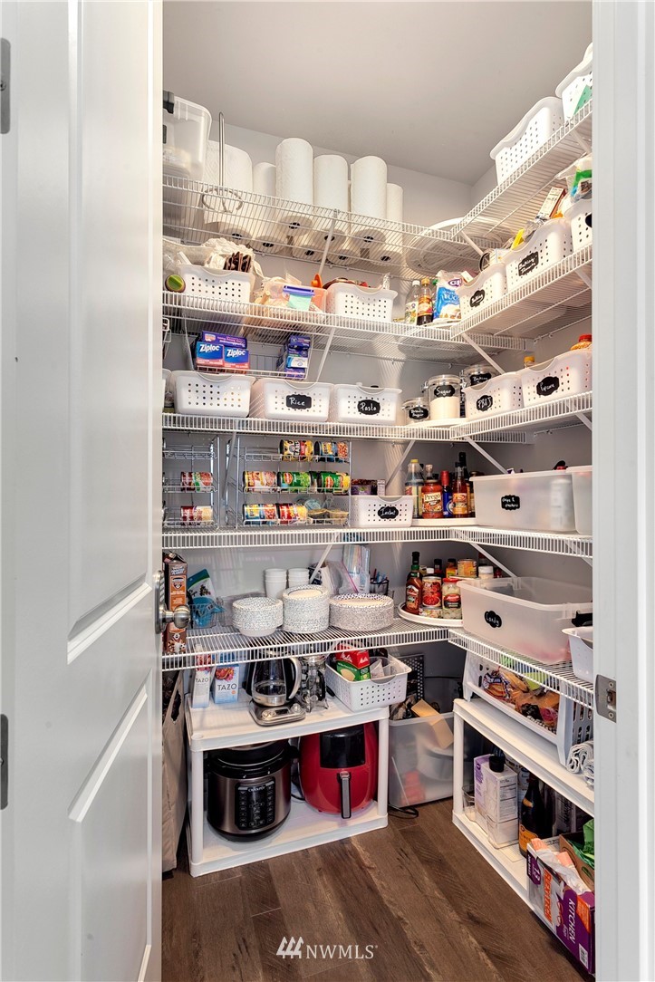 253 Field Place Southeast Renton, WA 98059 - Photo 18 of 40 a view of kitchen with stainless steel appliances cabinets and a table