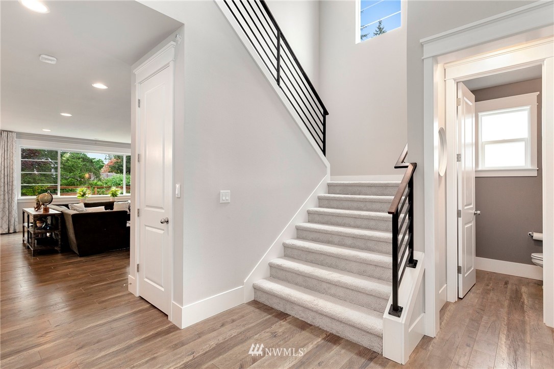 253 Field Place Southeast Renton, WA 98059 - Photo 22 of 40 a view of entryway and hall with wooden floor