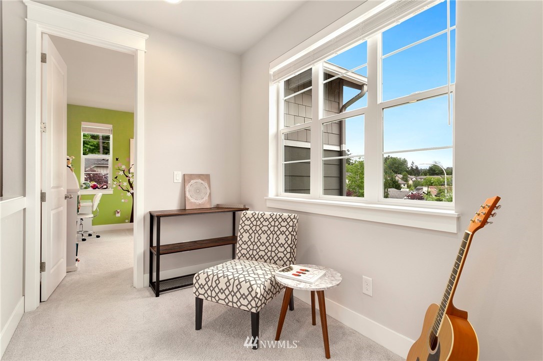 253 Field Place Southeast Renton, WA 98059 - Photo 33 of 40 a bedroom with a bed and a window