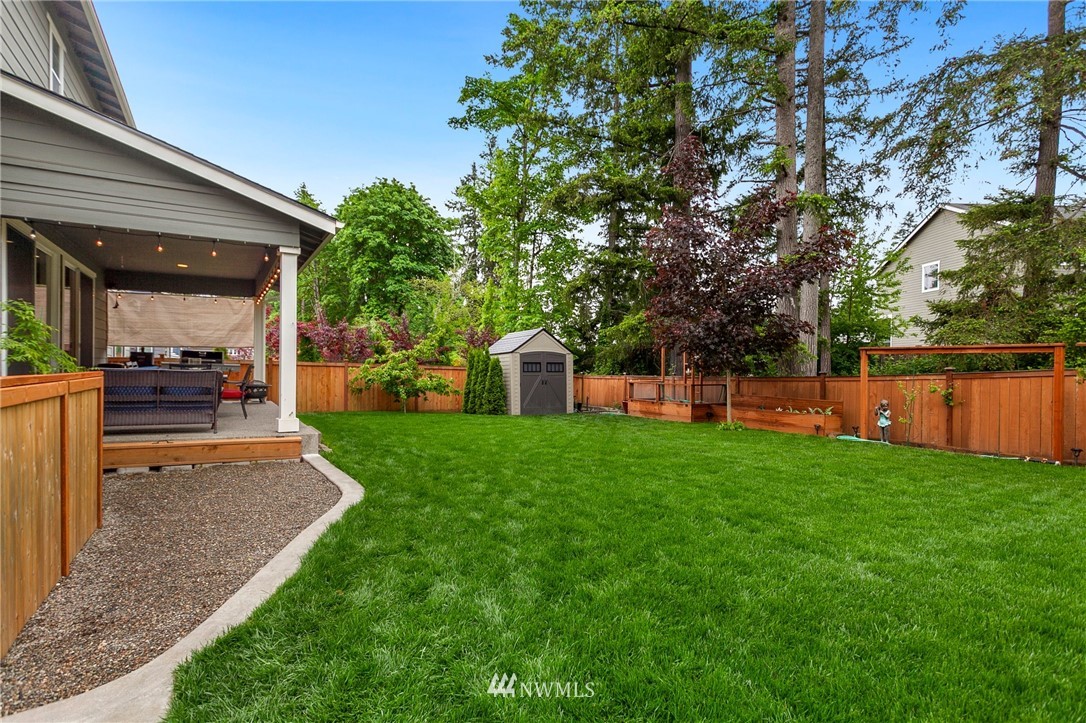 253 Field Place Southeast Renton, WA 98059 - Photo 39 of 40 a view of a backyard with large trees