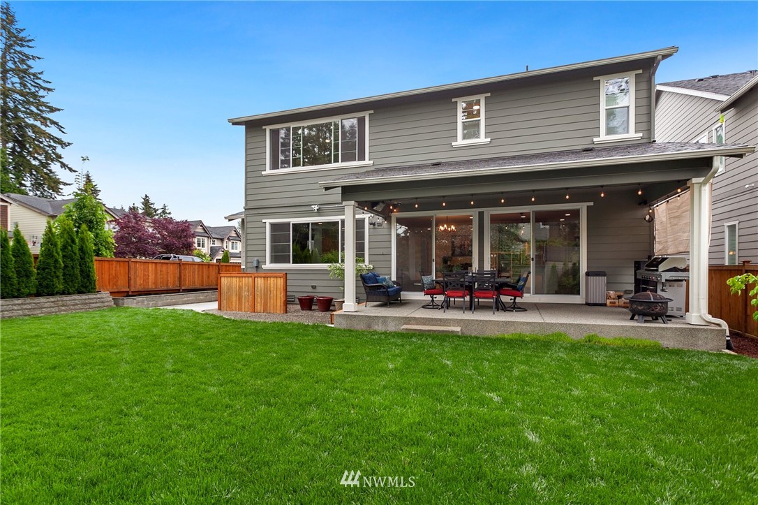 253 Field Place Southeast Renton, WA 98059 - Photo 40 of 40 a view of a house with sitting area and a swimming pool