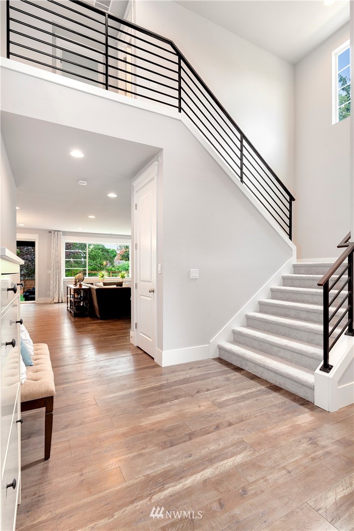 253 Field Place Southeast Renton, WA 98059 - Photo 6 of 40 a view of a living room and kitchen