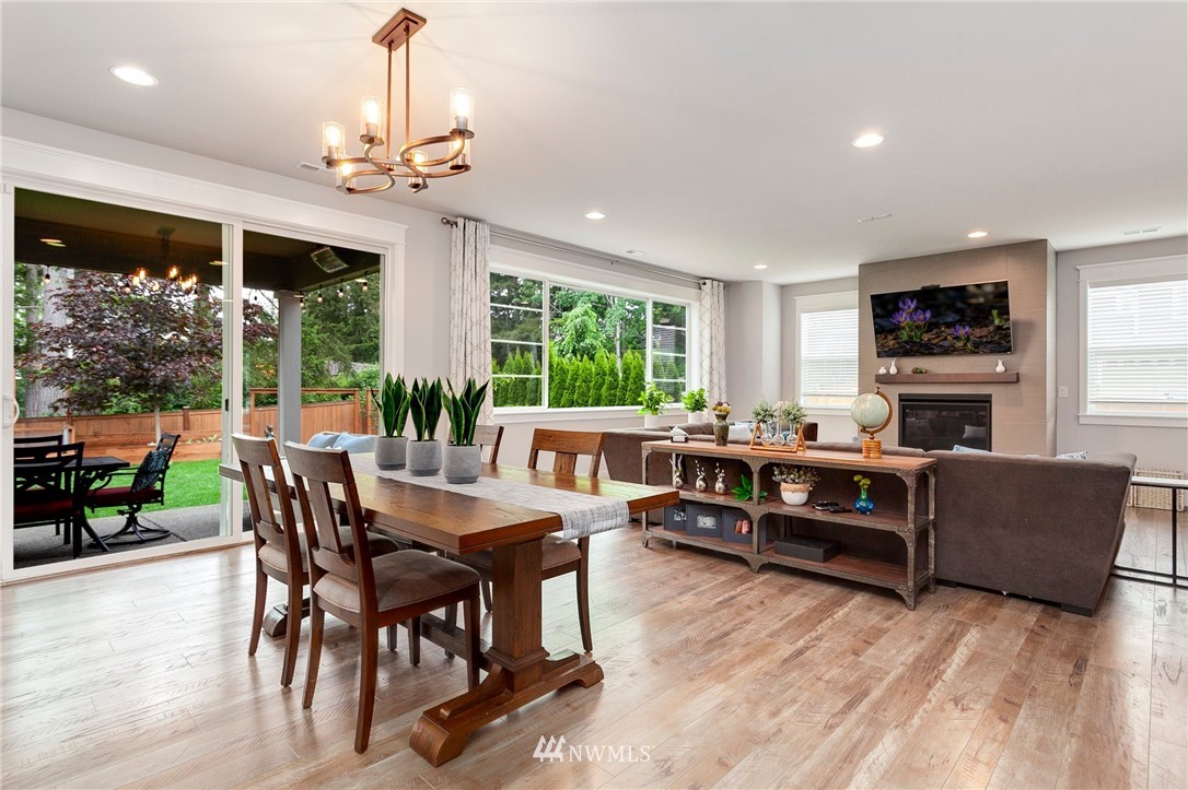 253 Field Place Southeast Renton, WA 98059 - Photo 7 of 40 a view of a dining room with furniture window and outside view