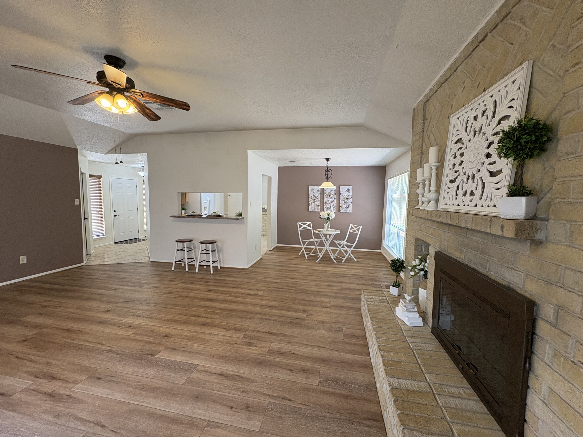 4834 Bridgemont Lane Spring, TX 77388 - Photo 3 of 23 Wood Burning Fireplace and Brick Wall Hearth