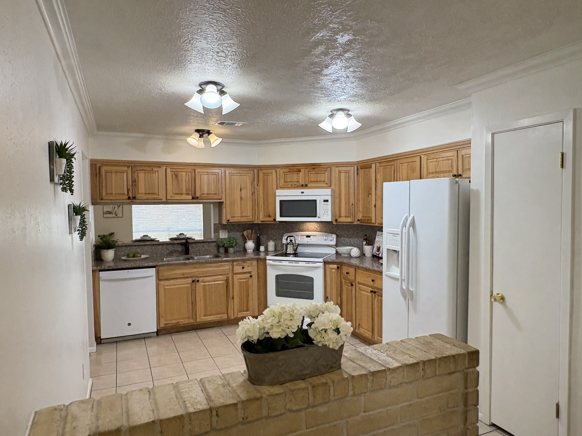 4834 Bridgemont Lane Spring, TX 77388 - Photo 8 of 23 View of Kitchen from Secondary Bedroom Hallway