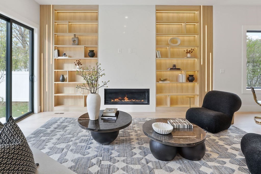 7 Hay Road Newton, MA 02459 - Photo 6 of 20 a living room with furniture a lamp and a fireplace