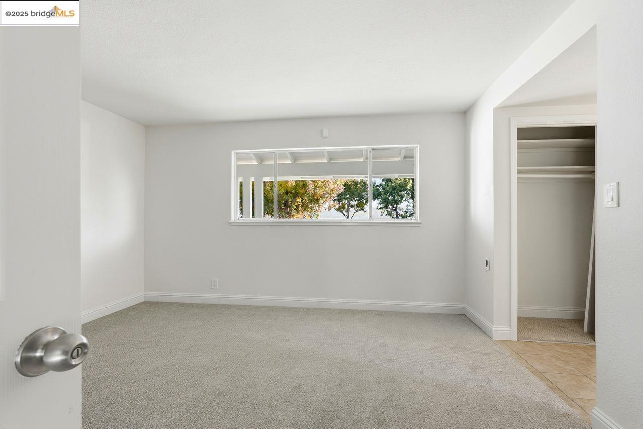 620 Chevy Chase Way Hayward, CA 94544 - Photo 20 of 38 an empty room with windows