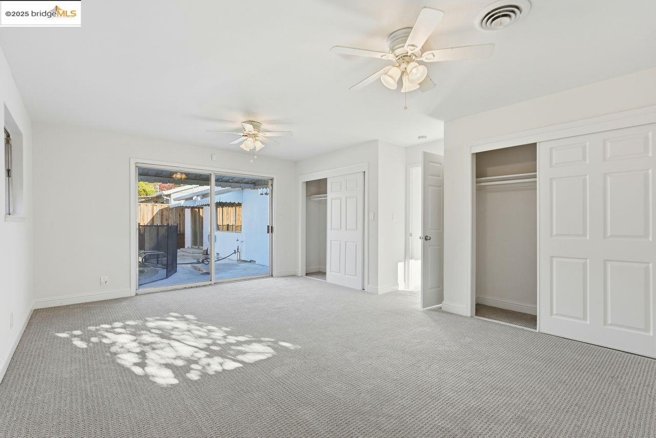 620 Chevy Chase Way Hayward, CA 94544 - Photo 29 of 38 a view of a livingroom with a chandelier fan and a window