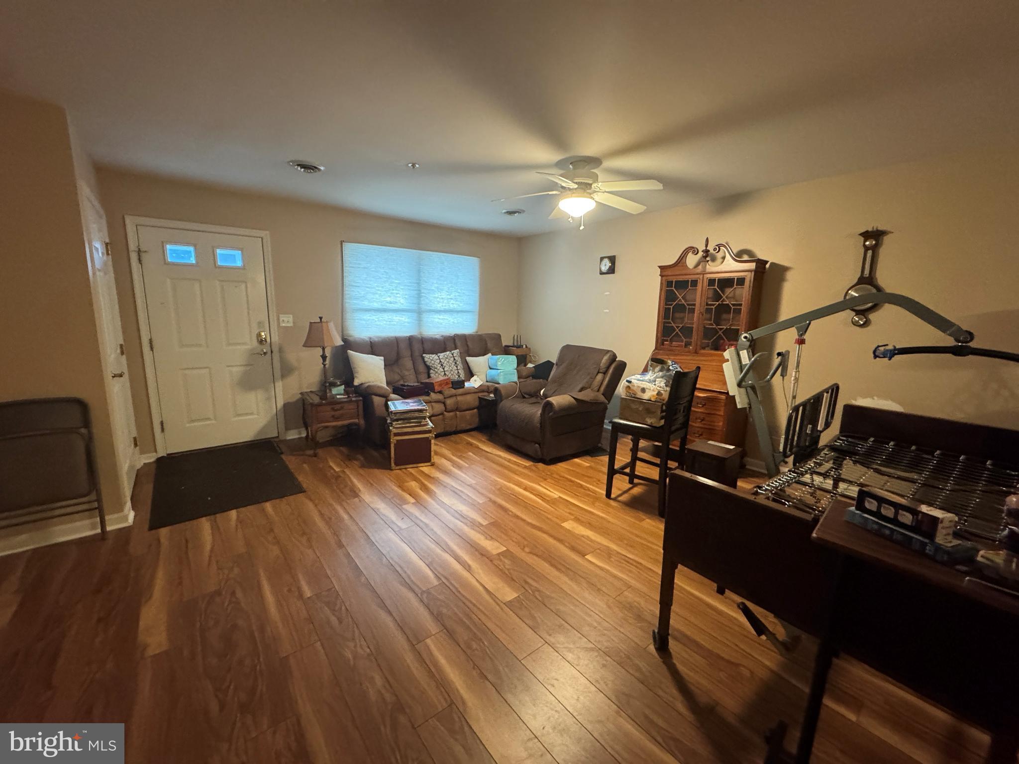 720 Naples Drive Hagerstown, MD 21740 - Photo 6 of 19 a living room with furniture and wooden floor
