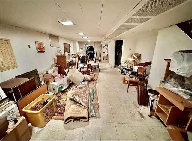 a very nice looking living room with dining room and furniture