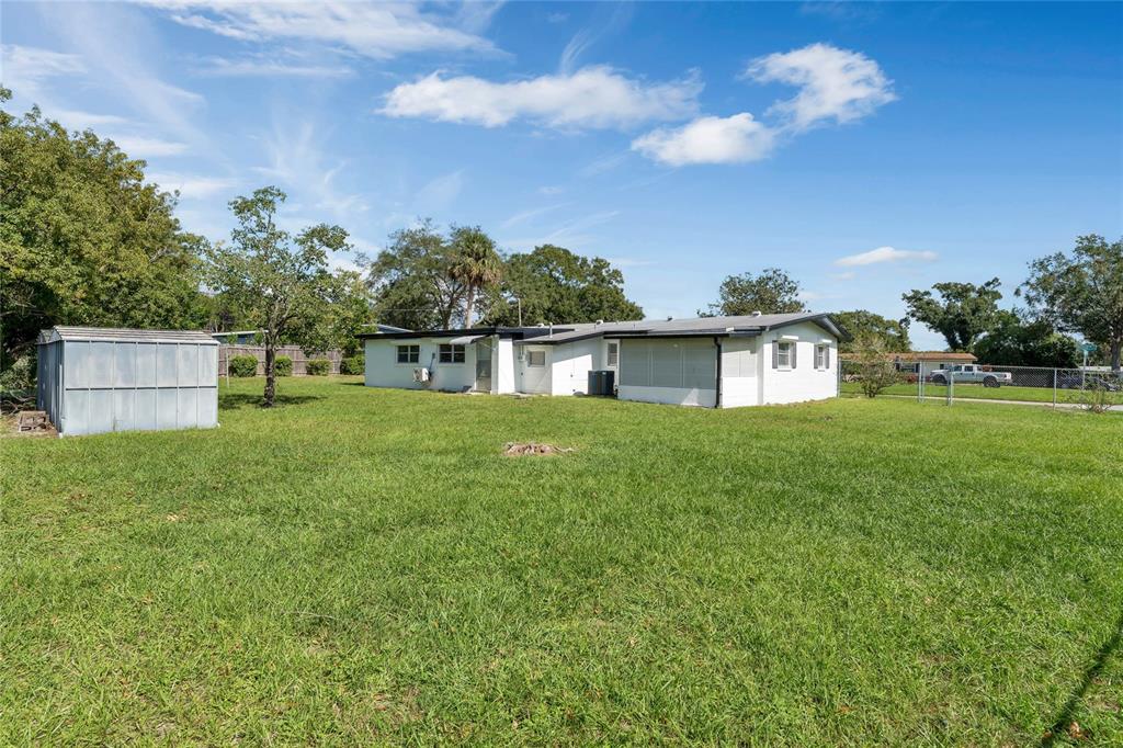 448 Ridge Drive Sanford, FL 32773 - Photo 18 of 20 a house view with swimming pool in front of it