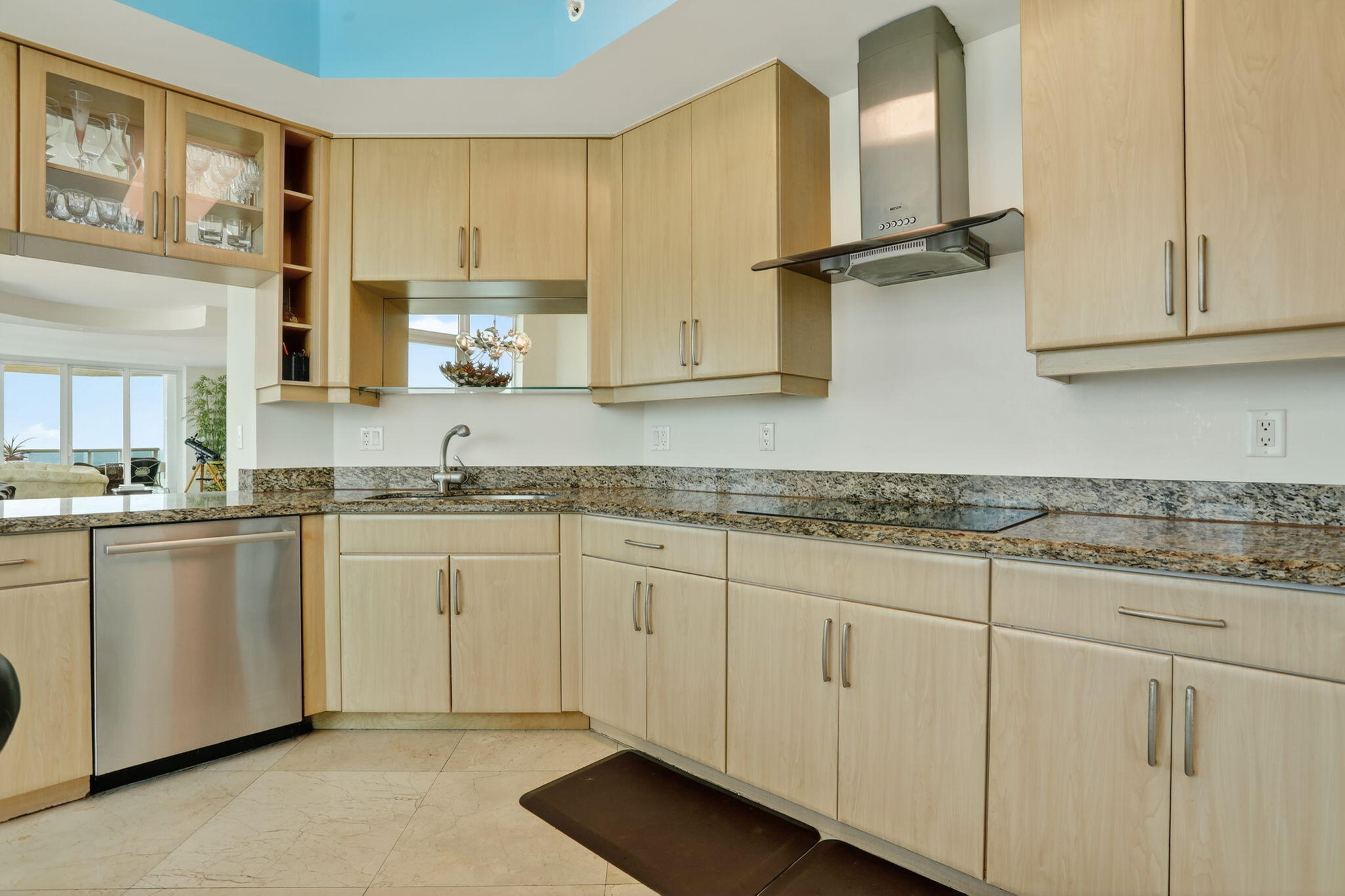 1430 South Ocean Boulevard, Unit 10A Lauderdale-by-the-Sea, FL 33062 - Photo 14 of 97 a kitchen with granite countertop white cabinets and a sink