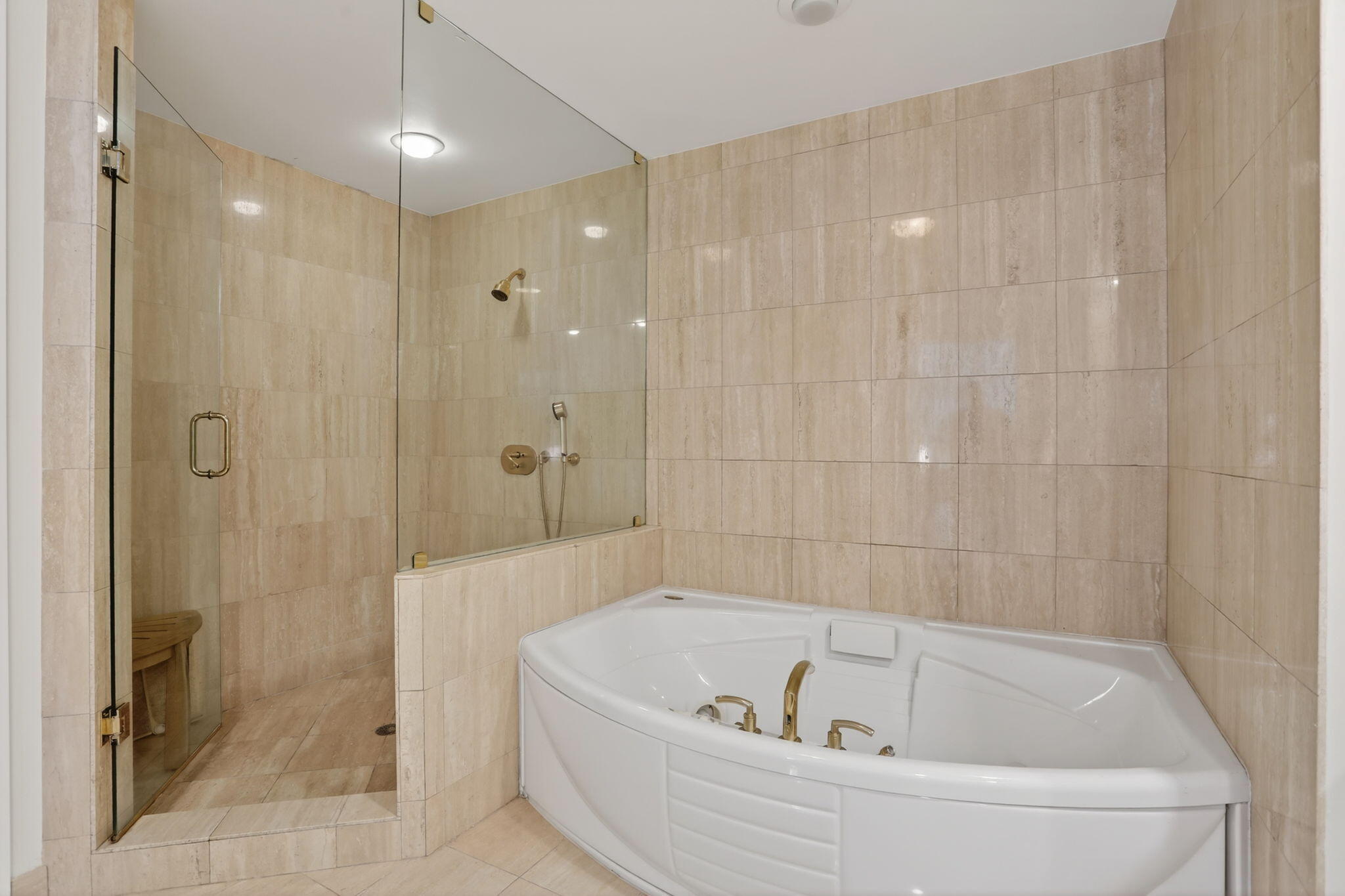 1430 South Ocean Boulevard, Unit 10A Lauderdale-by-the-Sea, FL 33062 - Photo 25 of 97 Primary Shower & Jacuzzi Tub