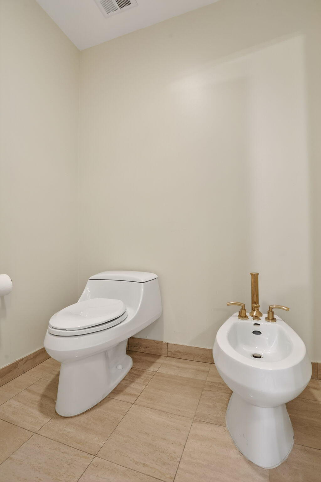 1430 South Ocean Boulevard, Unit 10A Lauderdale-by-the-Sea, FL 33062 - Photo 26 of 97 a bathroom with a sink and a toilet