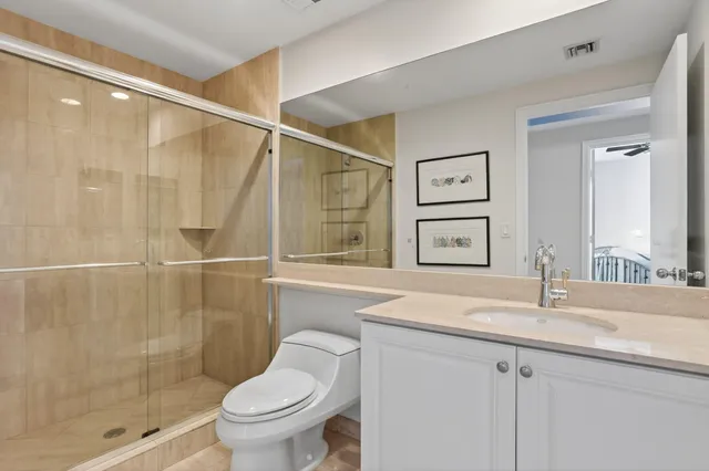 a room with furniture and a floor to ceiling window