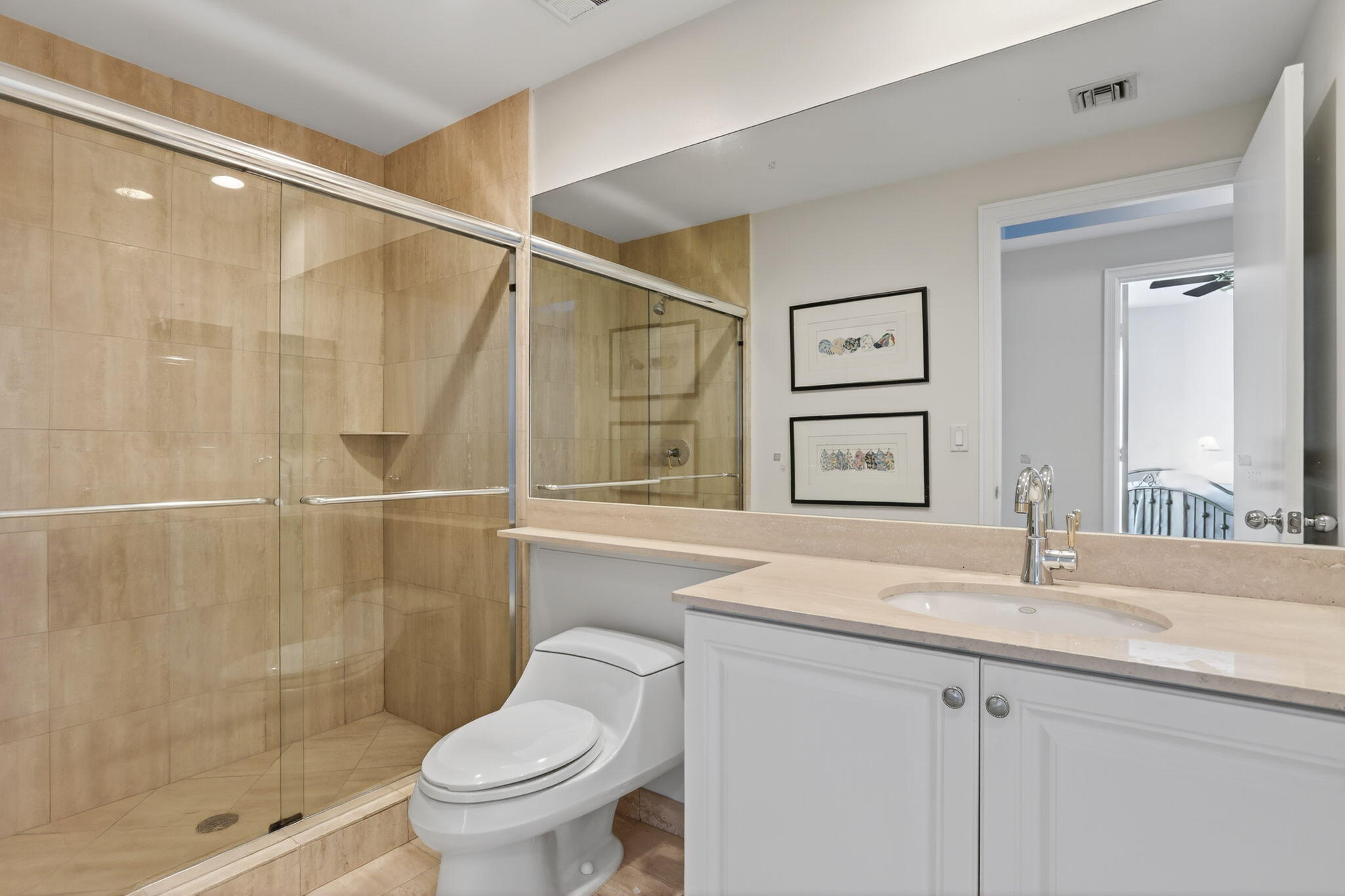 1430 South Ocean Boulevard, Unit 10A Lauderdale-by-the-Sea, FL 33062 - Photo 30 of 97 a bathroom with a sink toilet and shower