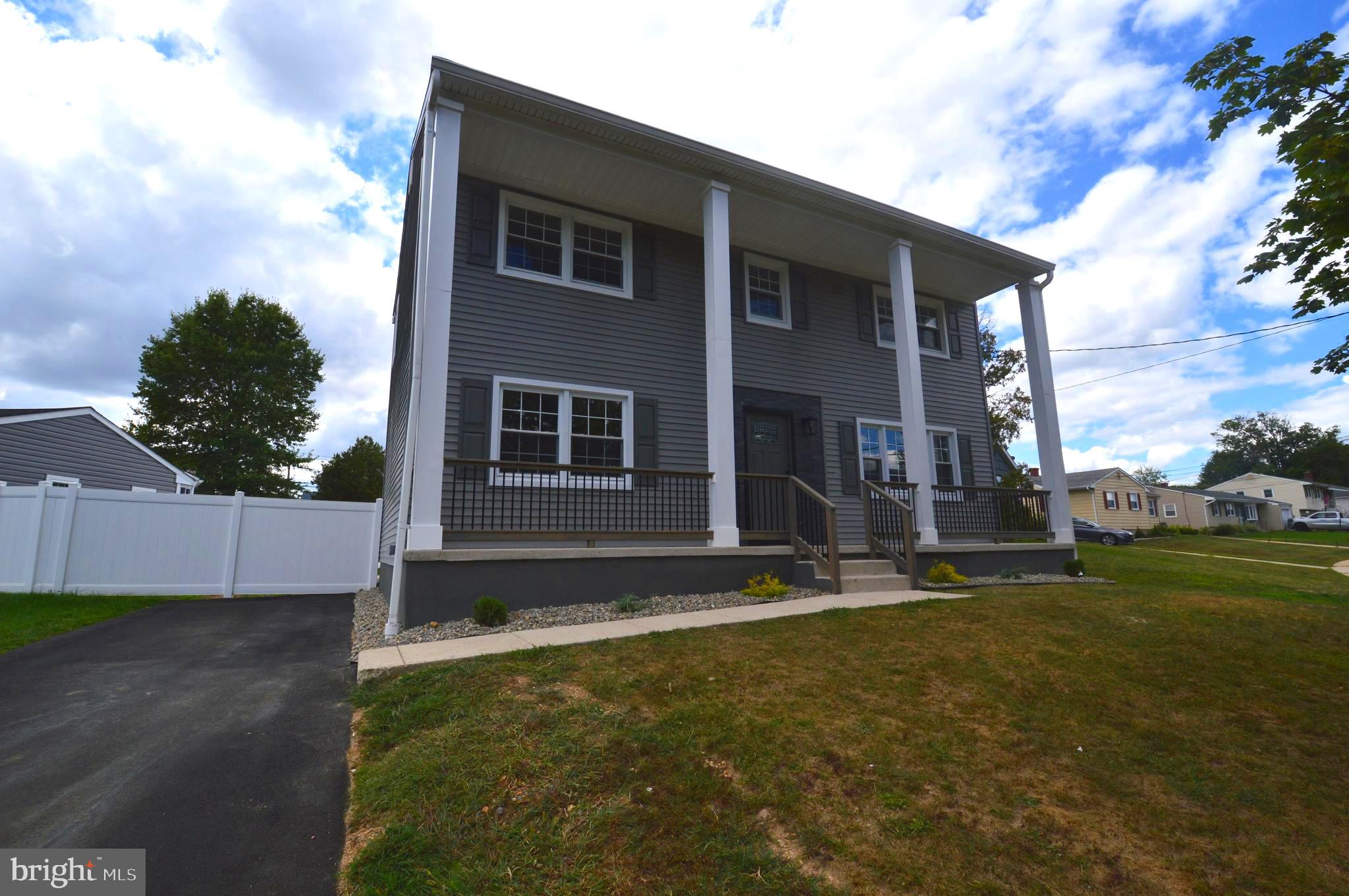 3 Sedgwick Road Hamilton, NJ 08690 - Photo 1 of 1 a backyard of a house with table and chairs