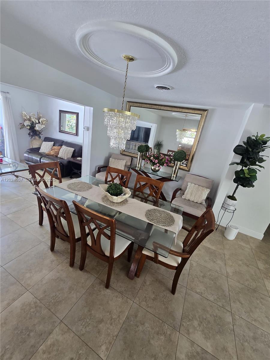 3619 West Park Road Hollywood, FL 33021 - Photo 5 of 19 a view of a livingroom and dining room