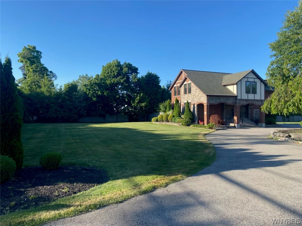 150 South Forest Road Amherst, NY 14221 - Photo 2 of 21 front yard entrance