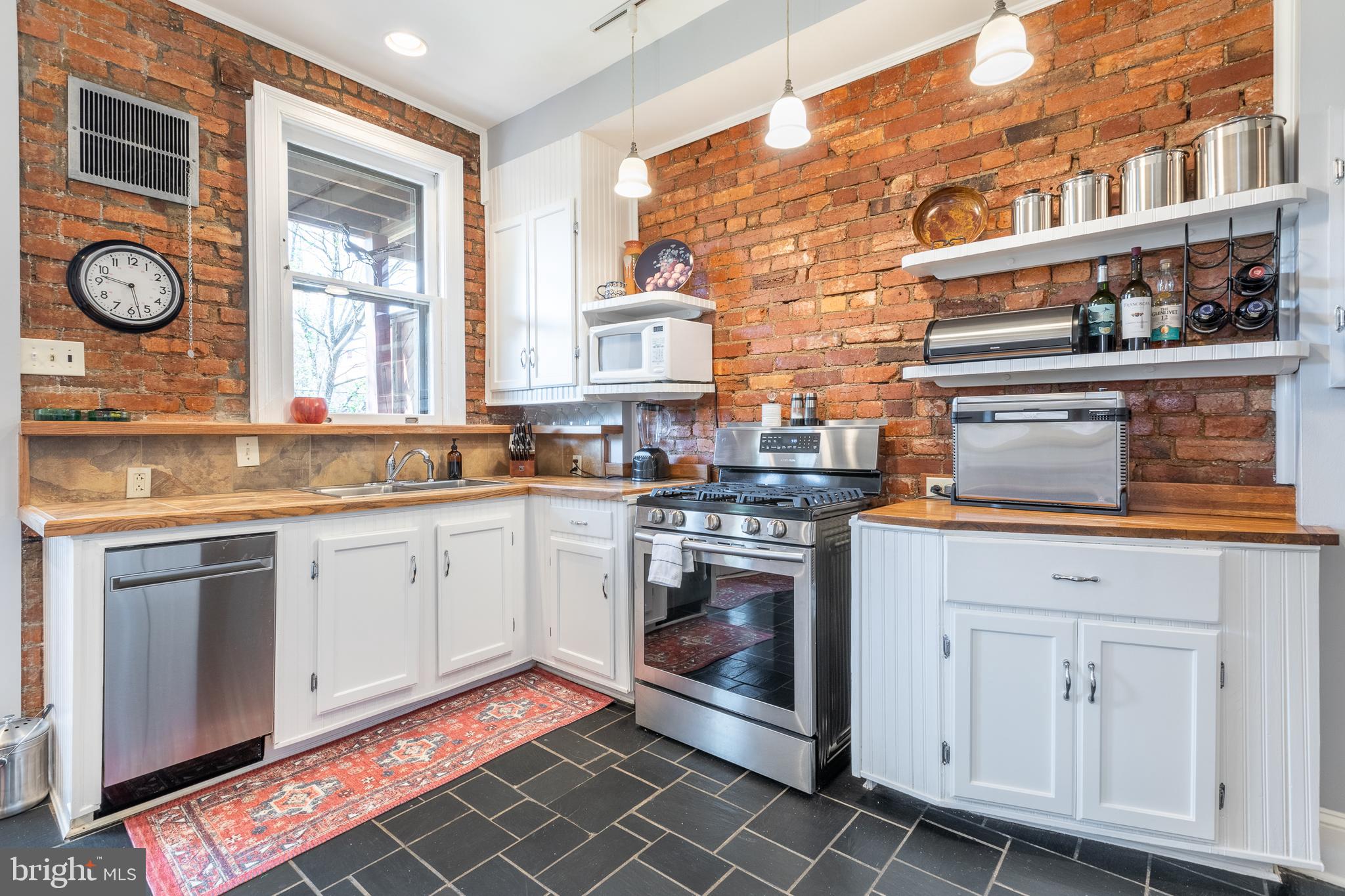 1732 Park Road Northwest Washington, DC 20010 - Photo 18 of 72 Exposed brick details throughout