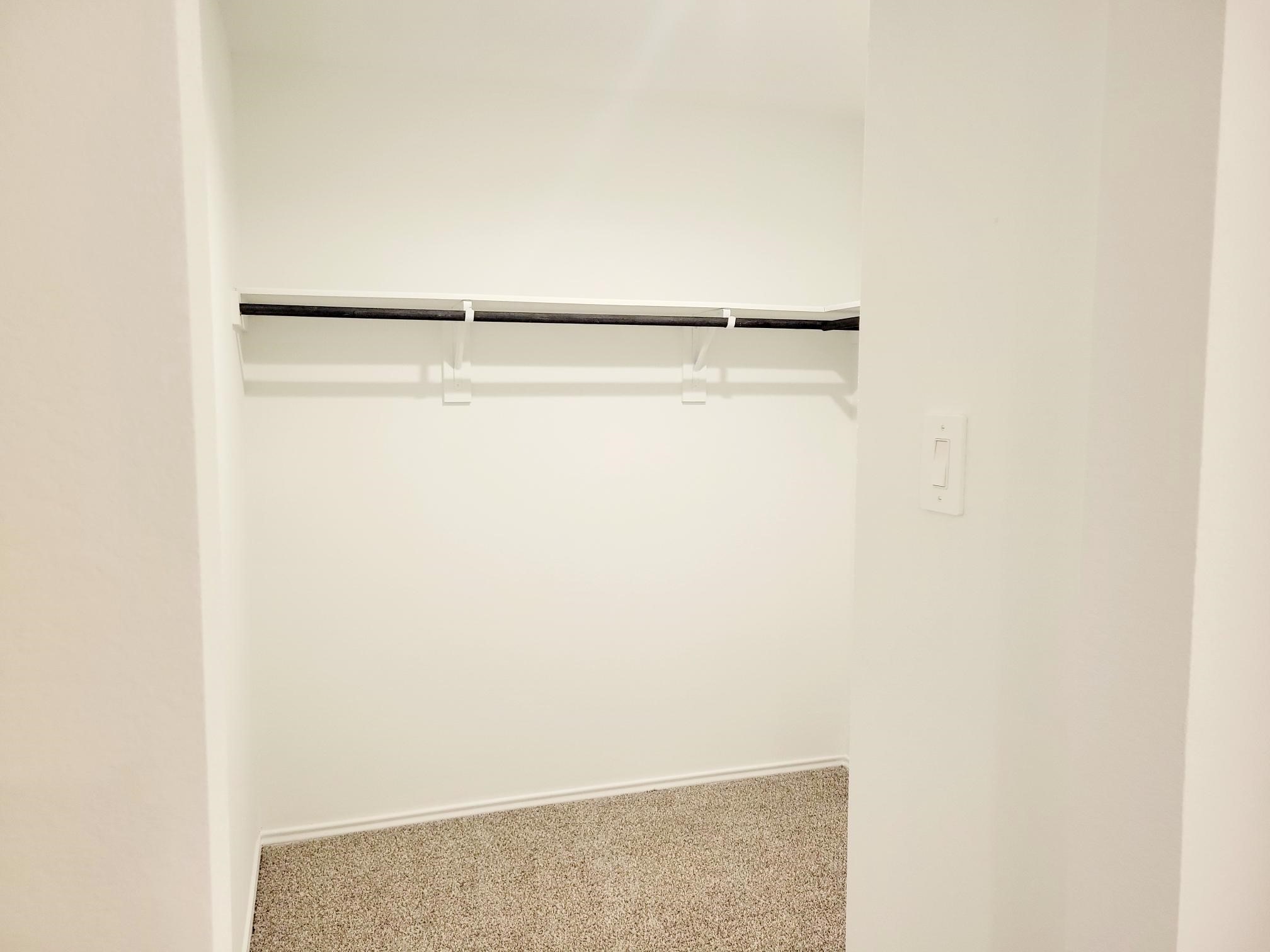 21522 Violet Ridge Road Katy, TX 77449 - Photo 15 of 40 a view of small space with racks on the wall