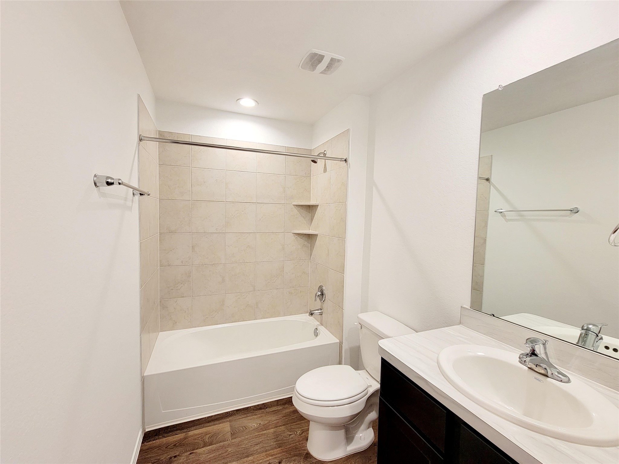 21522 Violet Ridge Road Katy, TX 77449 - Photo 32 of 40 a bathroom with a sink a toilet and a bathtub