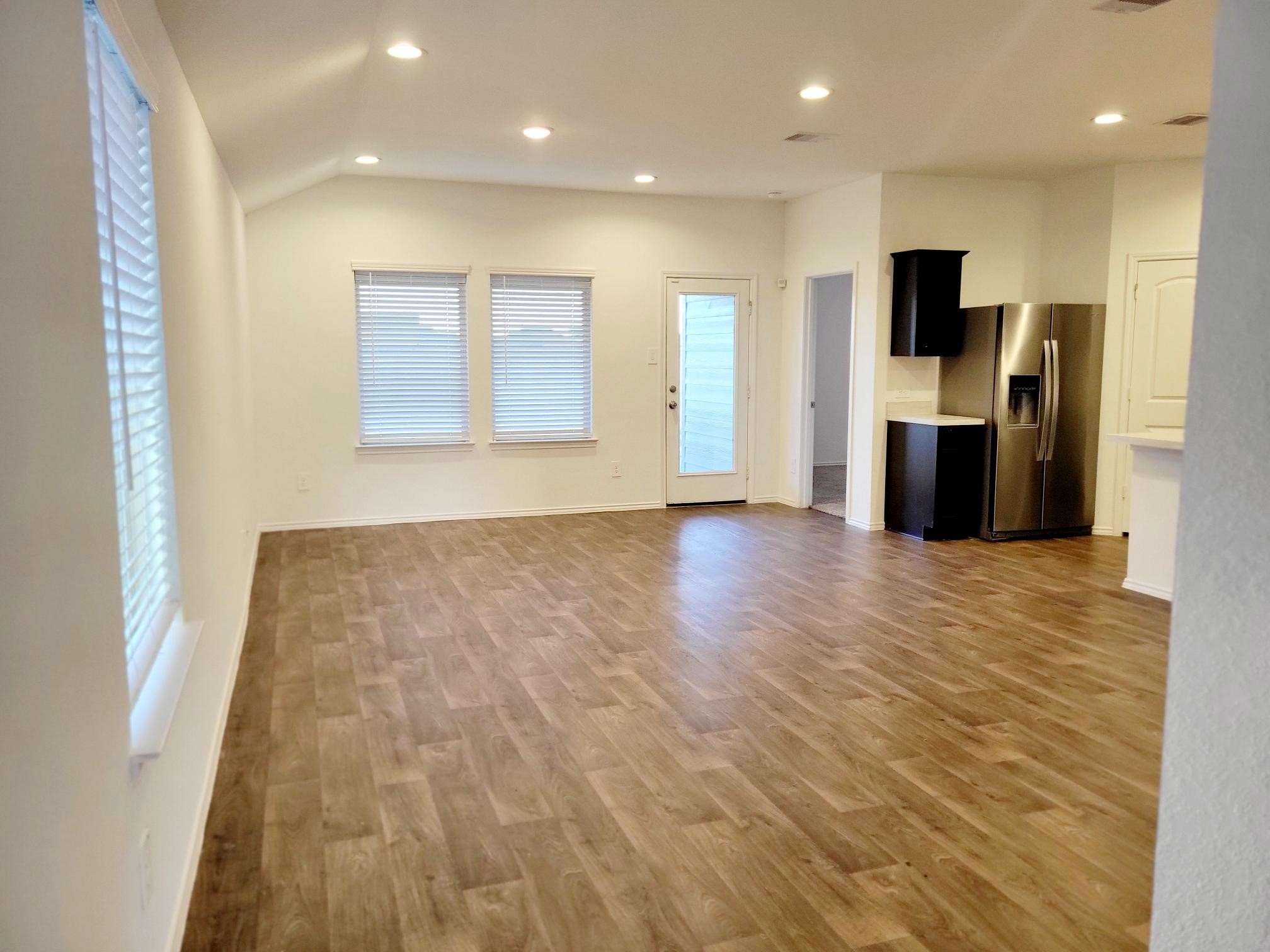 21522 Violet Ridge Road Katy, TX 77449 - Photo 6 of 40 a view of a kitchen with a sink