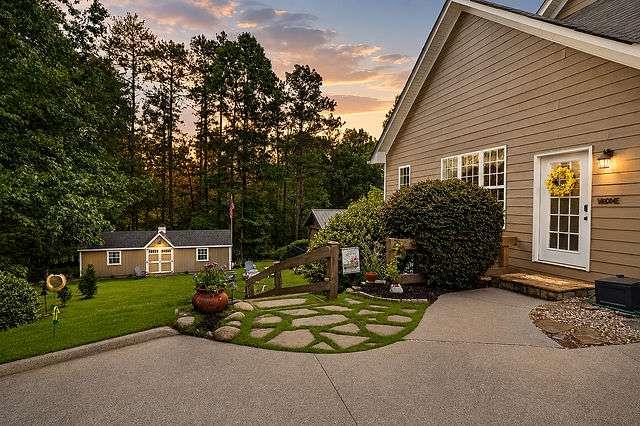 8179 Pineview Court Villa Rica, GA 30180 - Photo 32 of 41 a view of a house with backyard and trees