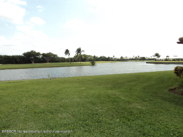 314 Cedar Key Circle Atlantis, FL 33462 - Photo 20 of 23 a view of a lake