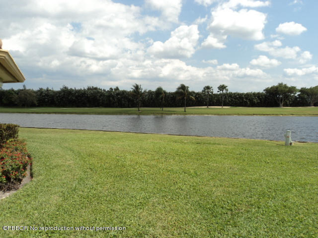 314 Cedar Key Circle Atlantis, FL 33462 - Photo 21 of 23 a view of an ocean and beach