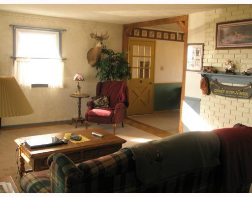 1495 Edmon Road Avonmore, PA 15618 - Photo 5 of 16 Living Room. The large living room offers beautiful parque flooring
