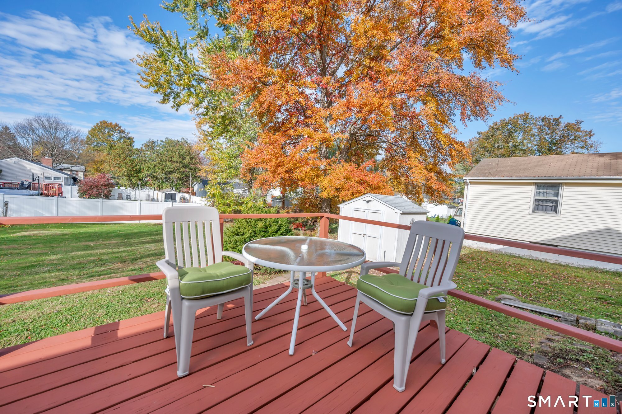 85 Florence Street Newington, CT 06111 - Photo 24 of 26 a view of a deck with furniture and a yard