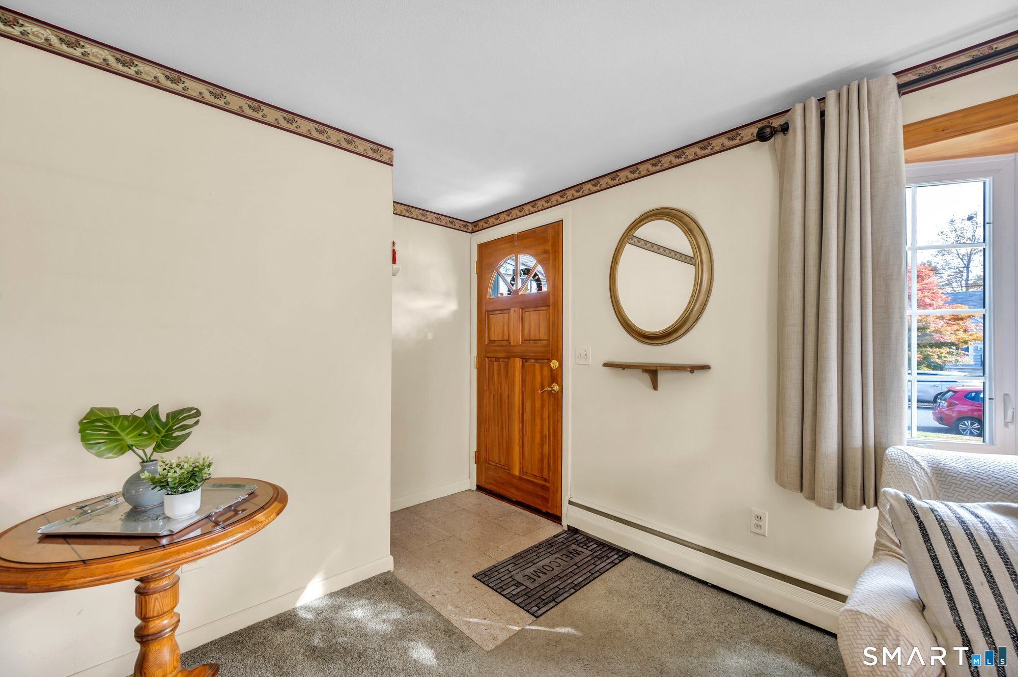 85 Florence Street Newington, CT 06111 - Photo 5 of 26 a living room with furniture and a potted plant