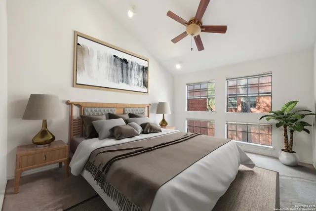 a bedroom with bed and a window