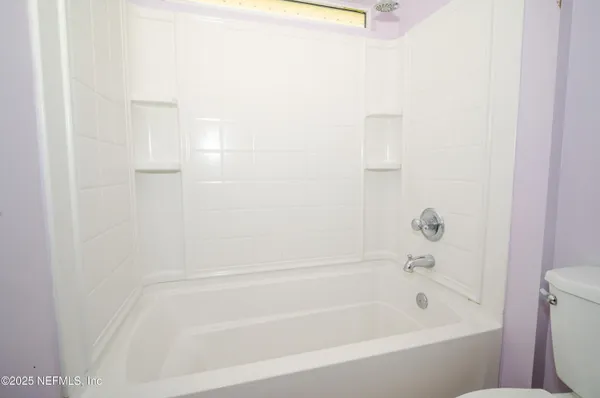 a bathroom with a bathtub