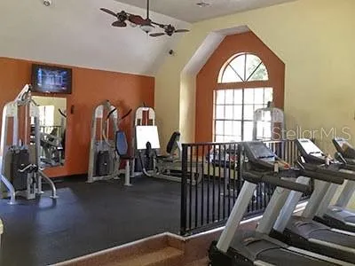 a view of hall way with furniture