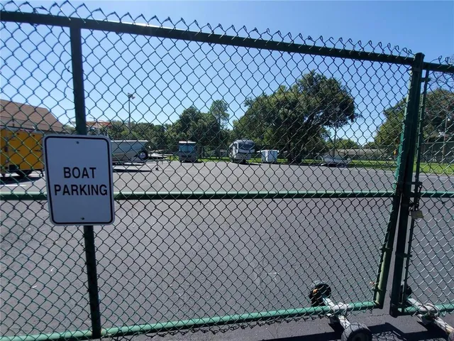 a view of outdoor space with wooden fence