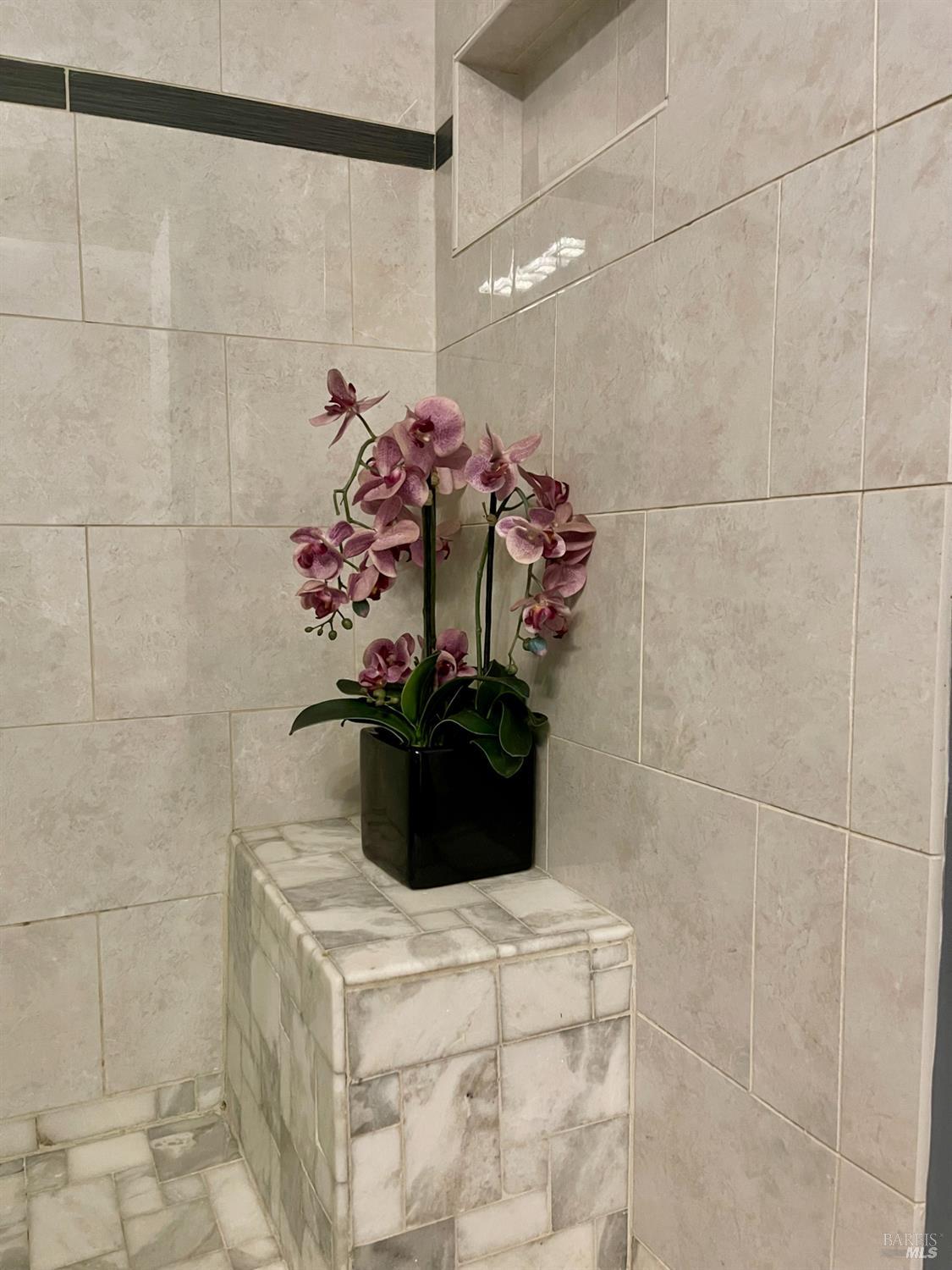 1 Embarcadero West, Unit 355 Oakland, CA 94607 - Photo 12 of 20 a bathroom with a sink and mirror