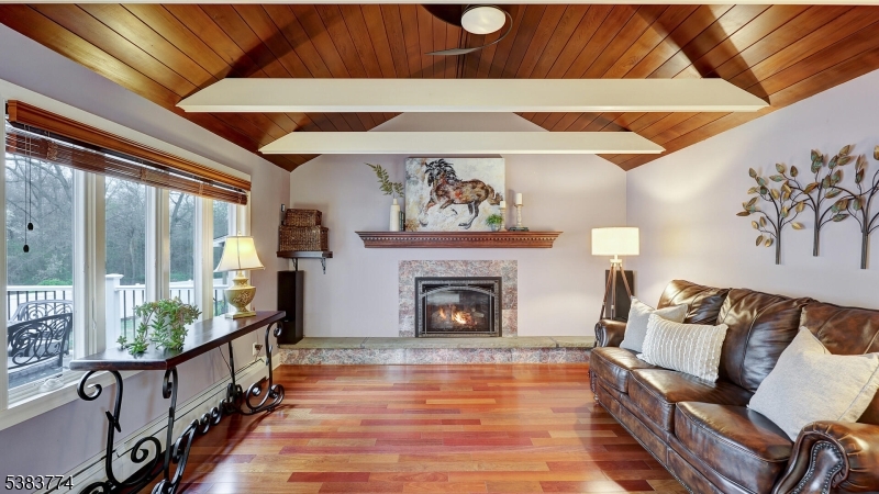 820 Rhine Boulevard Raritan, NJ 08869 - Photo 12 of 47 a living room with furniture and a fireplace