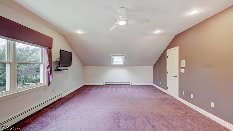 820 Rhine Boulevard Raritan, NJ 08869 - Photo 26 of 47 an empty room with windows and chandelier