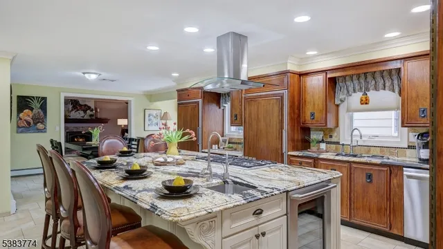 a kitchen that has a table and chairs in it