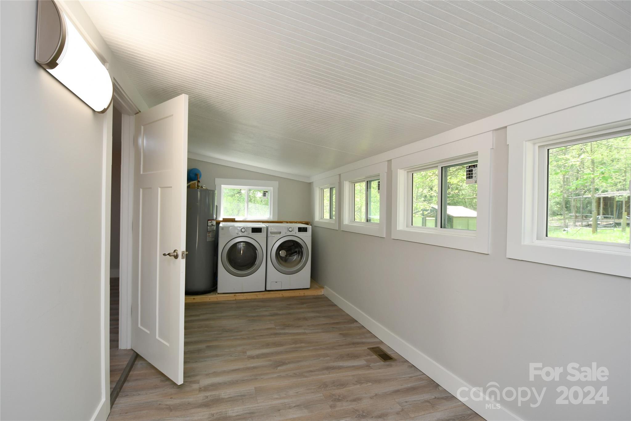 18 Rocky Slope Road Asheville, NC 28804 - Photo 11 of 41 a view of a hallway with washer and dryer